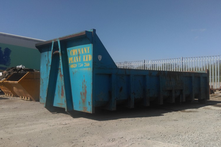 One of our blue 20 yd³ Roll-on, Roll-off skips in the storage yard.